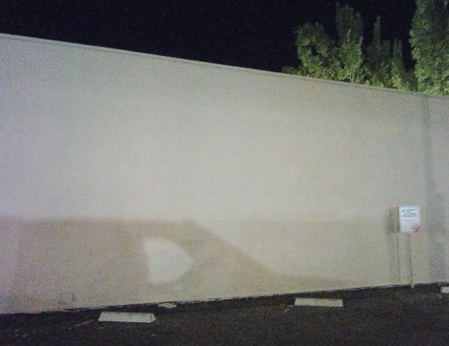 Standard visible-light photo of the inspected CMU exterior wall